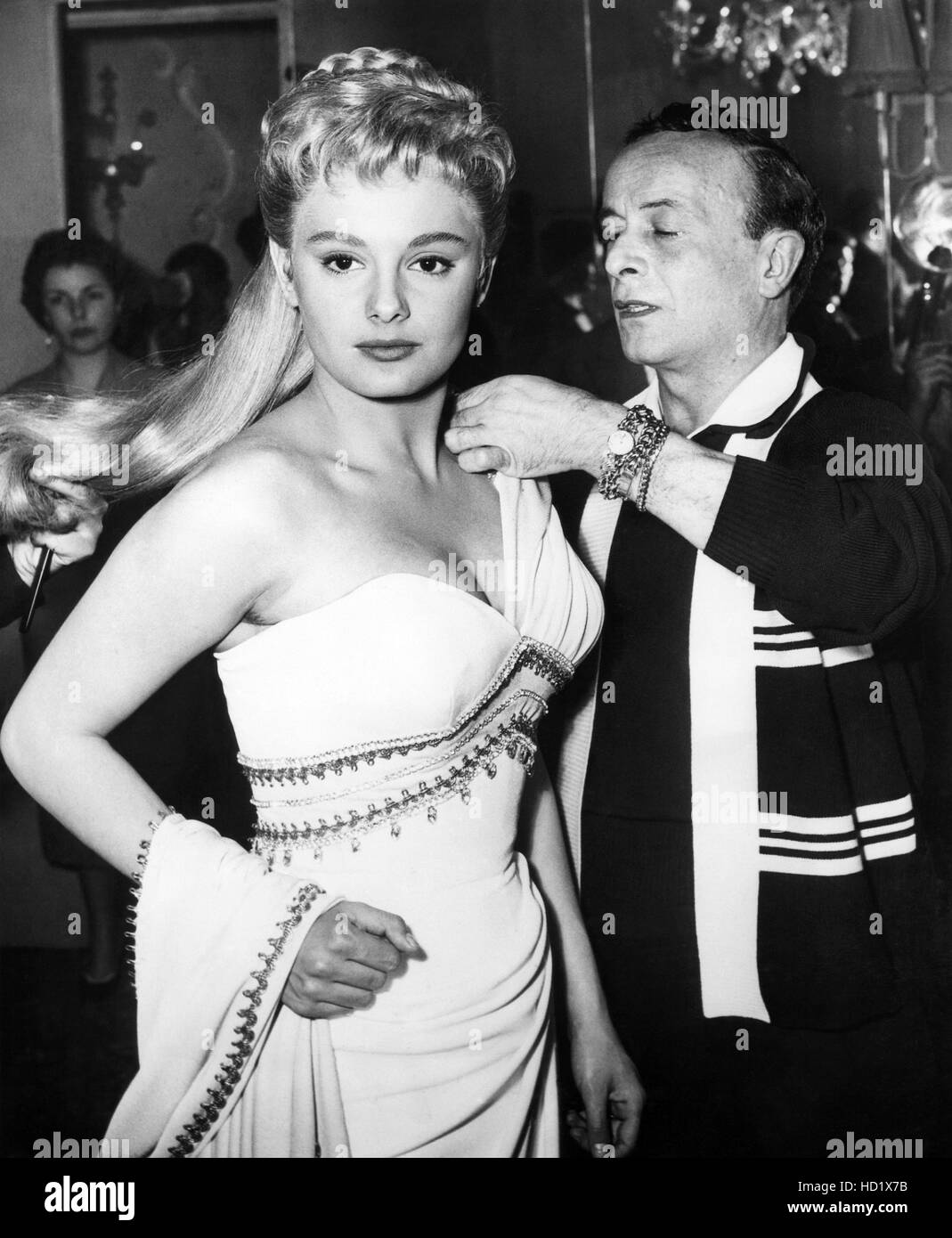 From left Rossana Podesta, Italian stylist Emilio Schuberth, ca. 1954