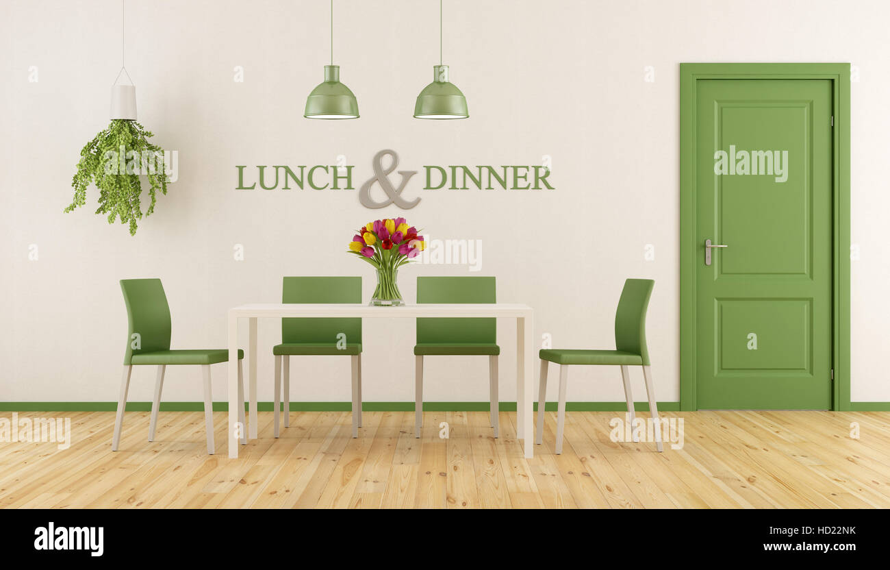 White and green dining room with minimalist table and closed door - 3d rendering Stock Photo