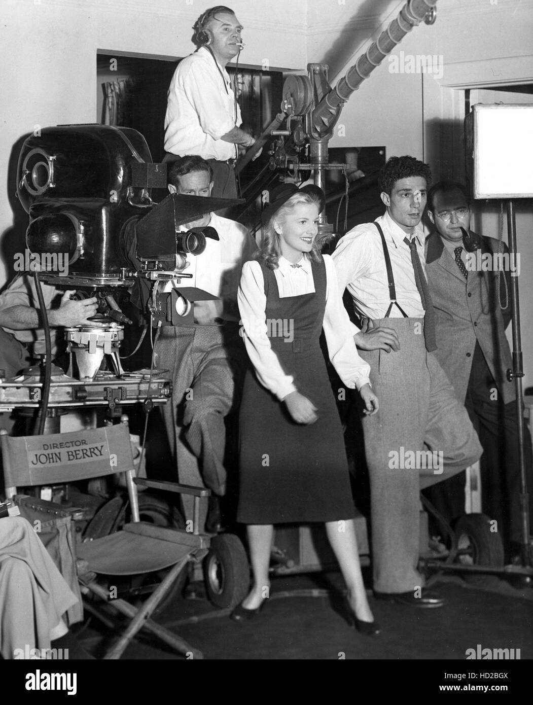 John Berry (right, in suspenders) directs FROM THIS DAY FORWARD, with Joan Fontaine at his side, 1946 Stock Photo
