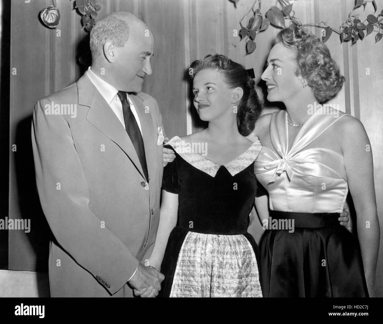 Samuel Goldwyn, Joan Evans, Joan Crawford, at Crawford's press party at ...