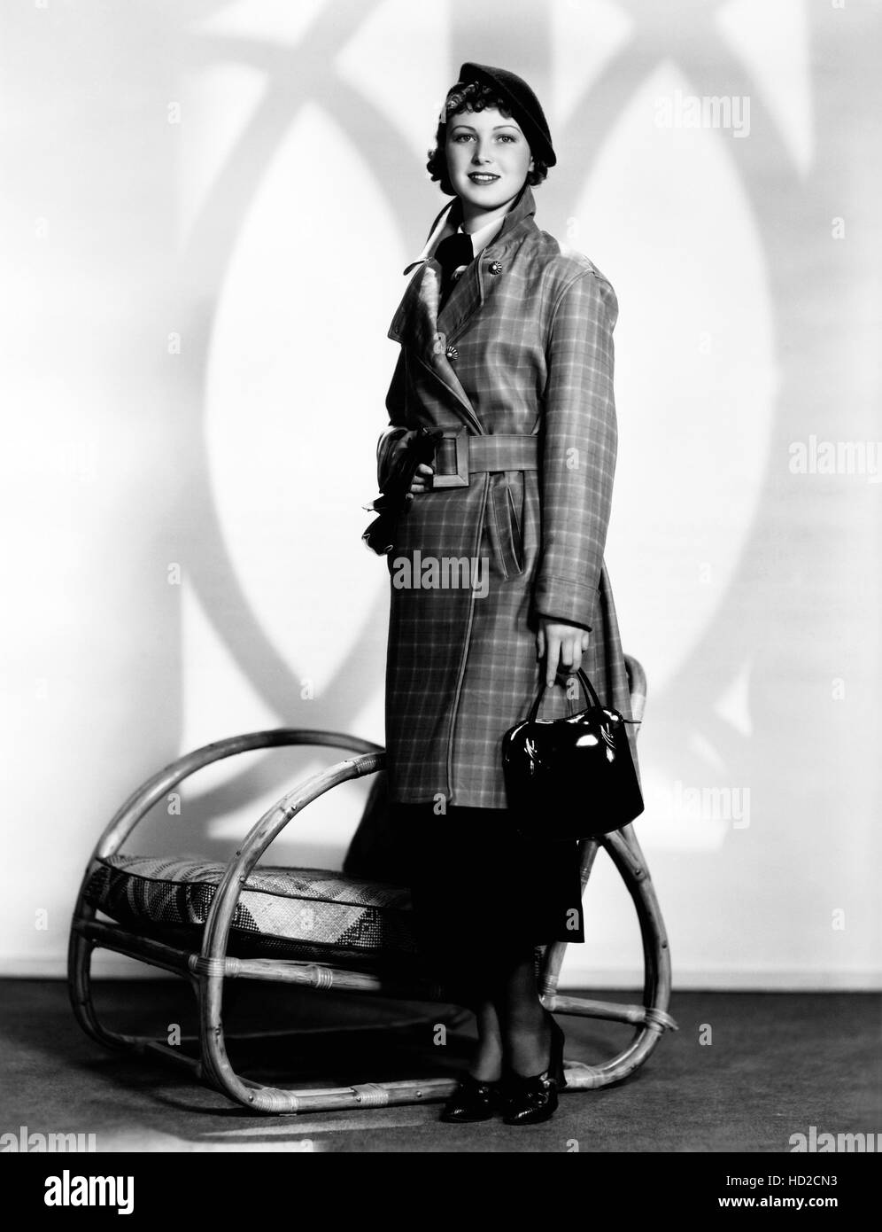 June Lang models a green and white plaid suede coat. 1936. ©20th Century-Fox Film Corporation, TM & Copyright/courtesy Everett Stock Photo