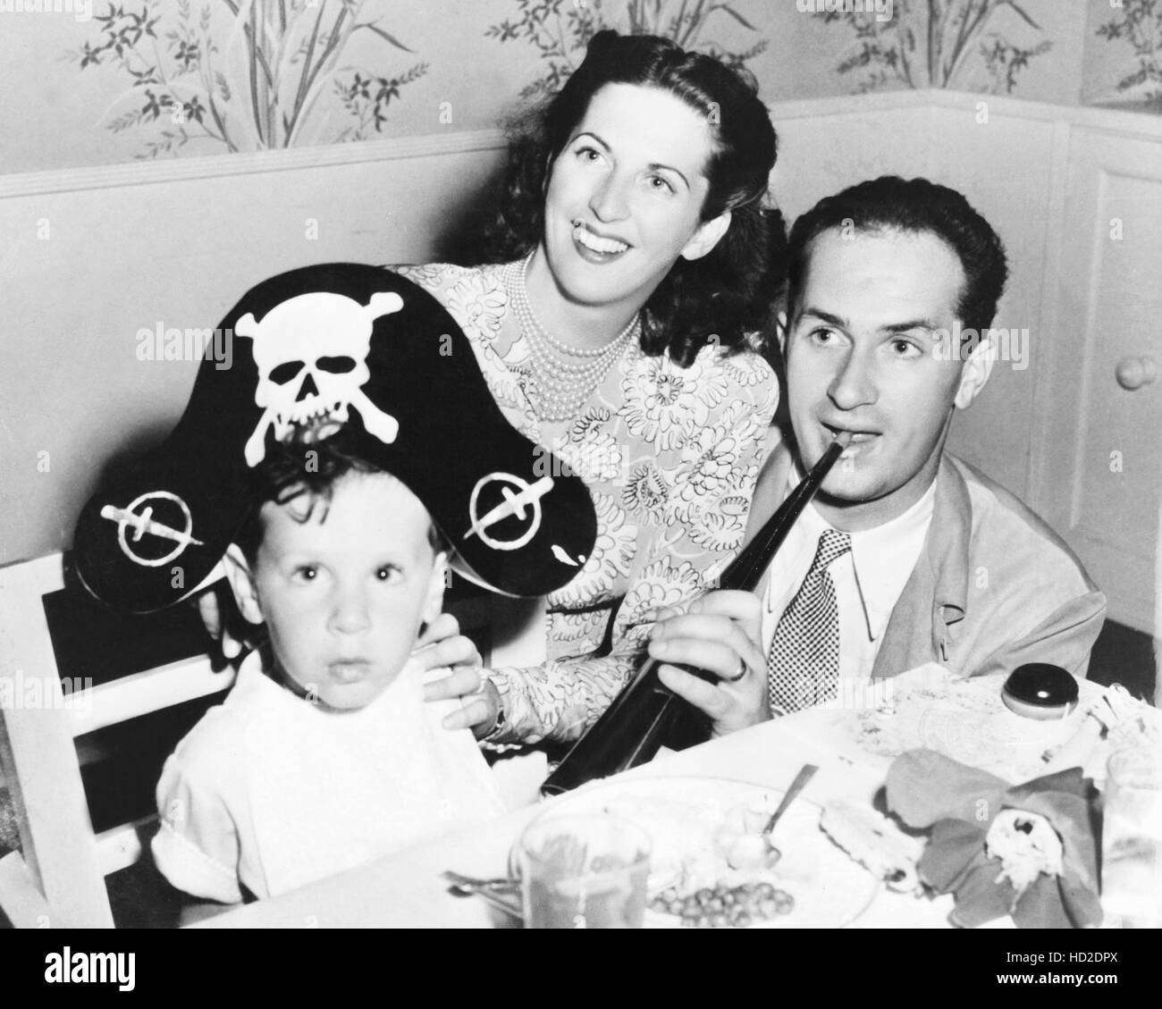 Keenan Wynn (right) and wife Eve Abbott Wynn celebrate the third