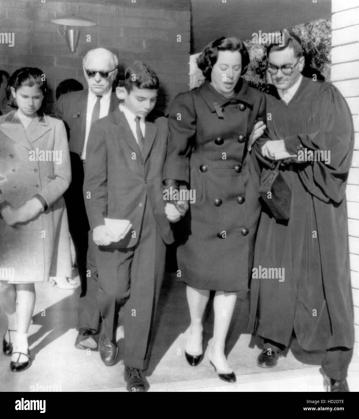 Kitty Carlisle (second from right) leaving her husband's funeral