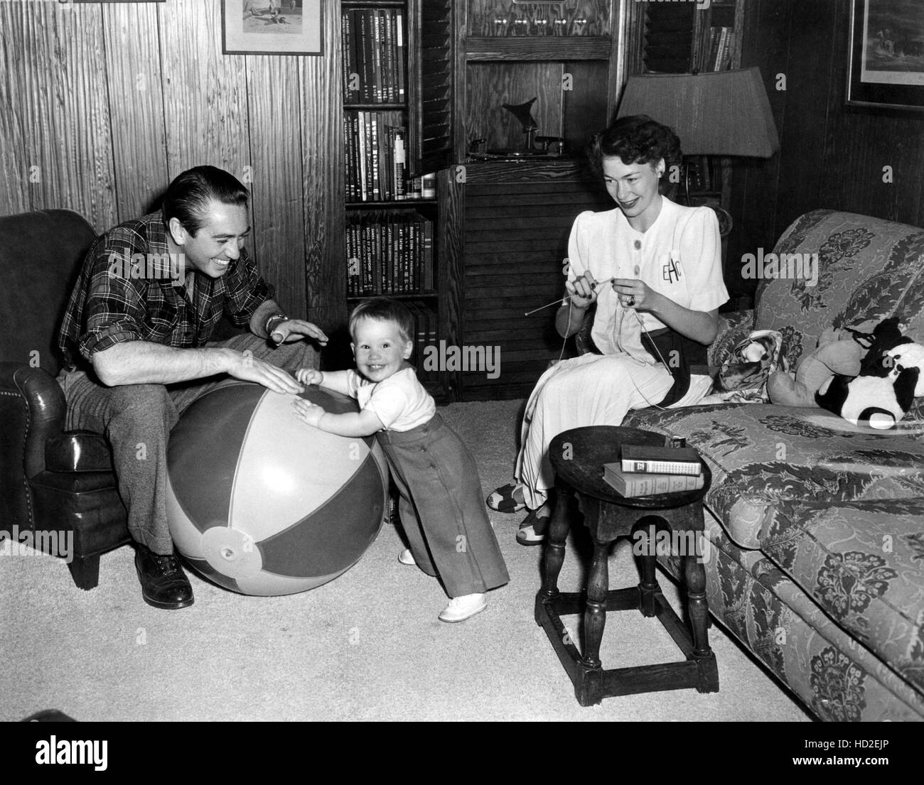 From left: Macdonald Carey, Lynn Carey, Betty Carey, at home, ca. 1947