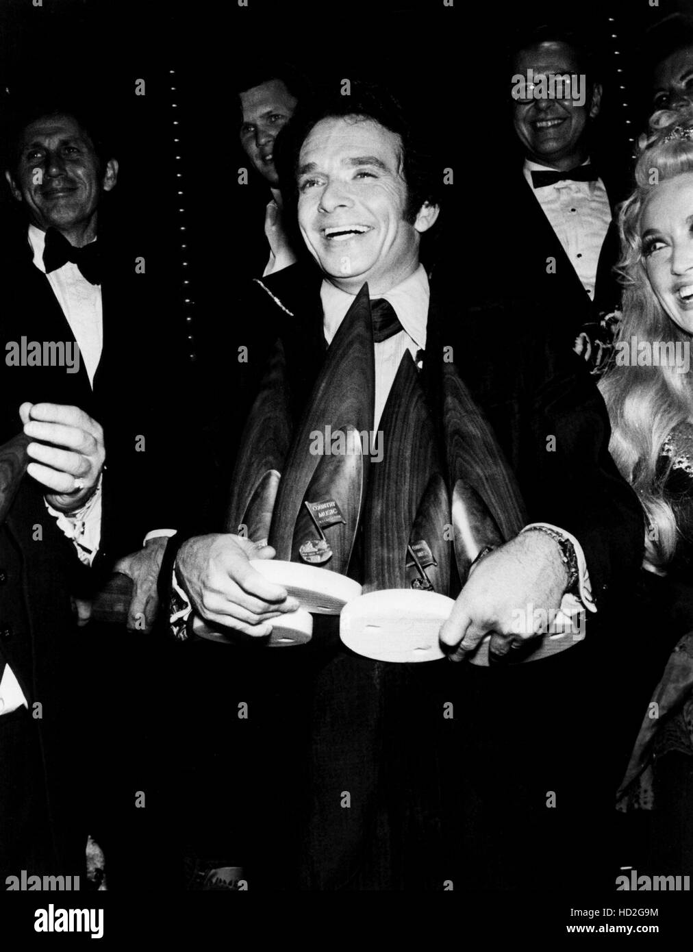 Merle Haggard holding his multiple Country Music Association Awards, 1970 Stock Photo