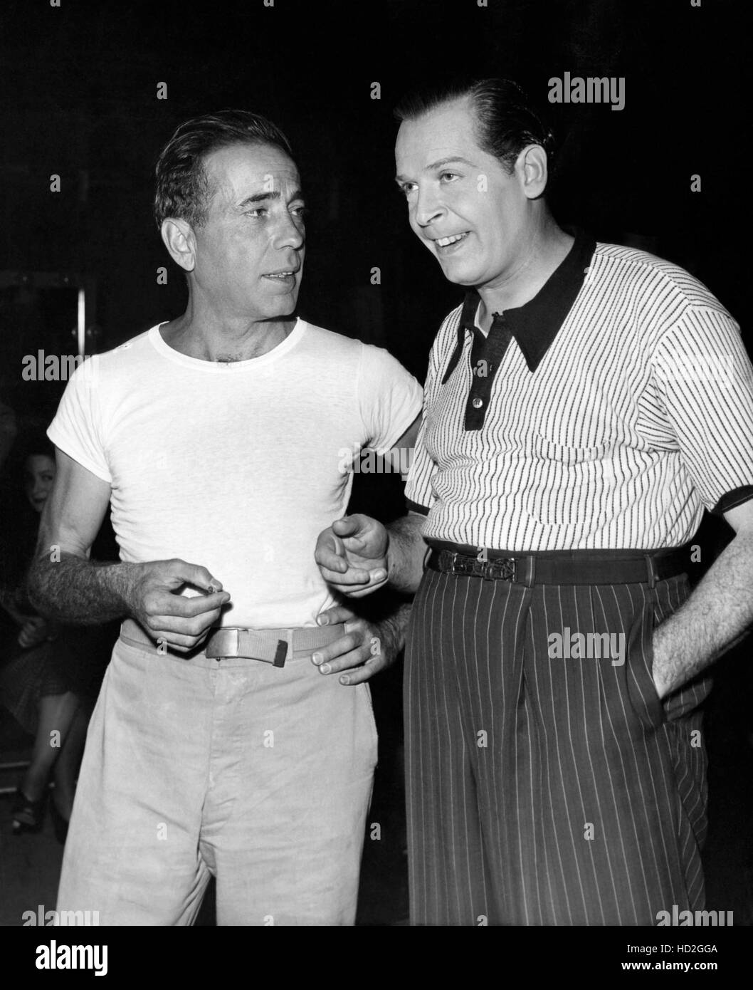 Humphrey Bogart visits Milton Berle on the set of ALWAYS LEAVE THEM  LAUGHING, 1949 Stock Photo - Alamy