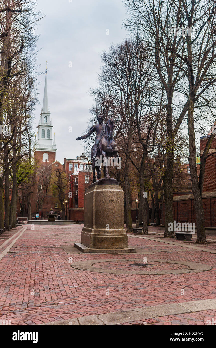 Boston, USA - April 28, 2015: Old North Church and Statue of Paul Revere in downtown Boston, Massachusetts, the United States. People on the backgroun Stock Photo