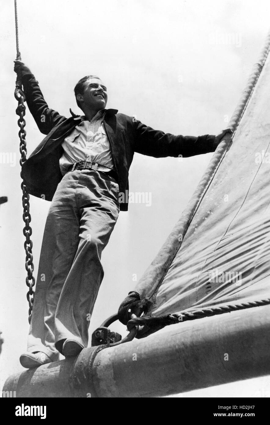 EBB TIDE, Ray Milland rides the boom of the 'Golden State' on location