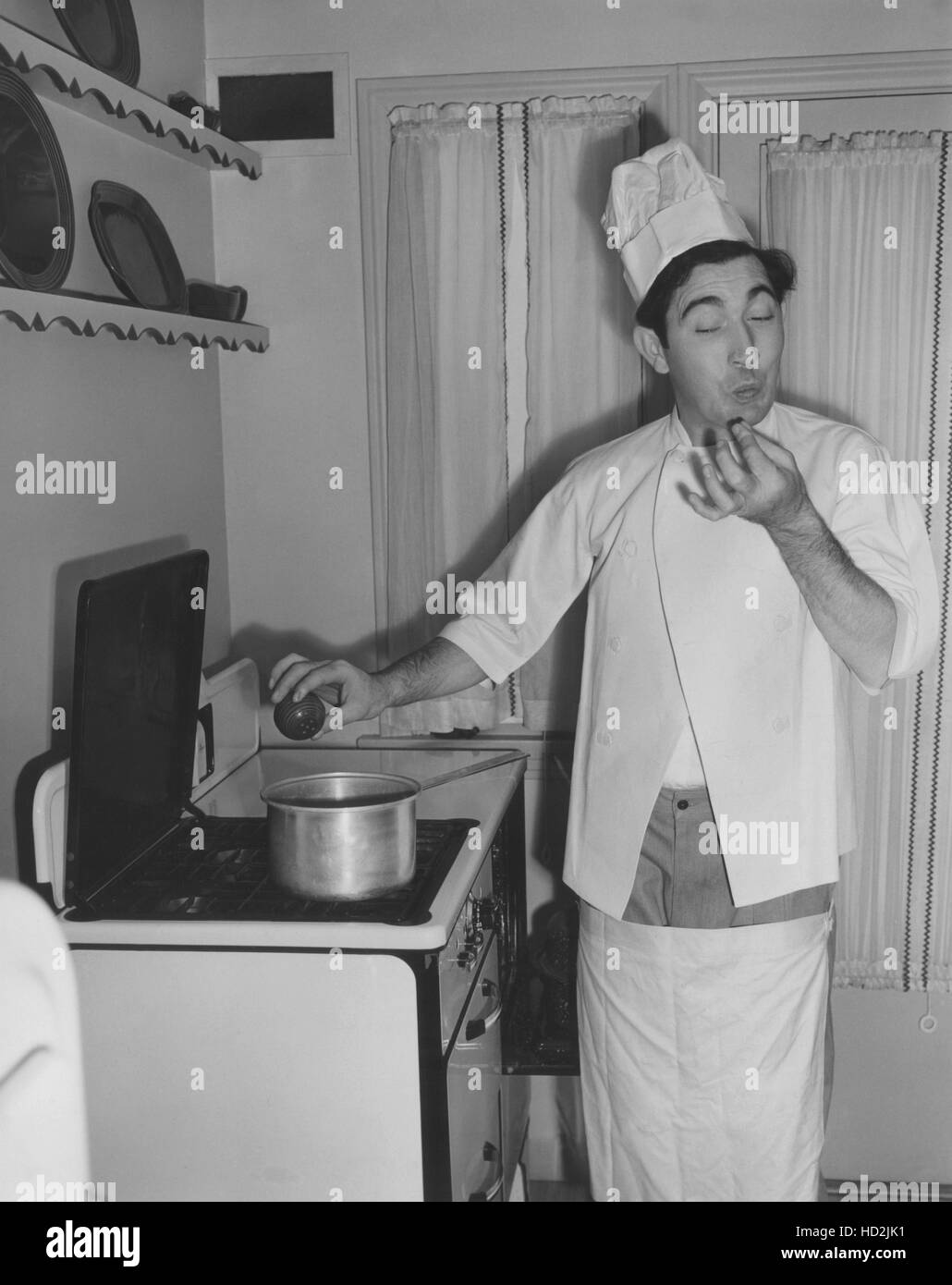 Rags Ragland cooking at home, 1942 Stock Photo Alamy