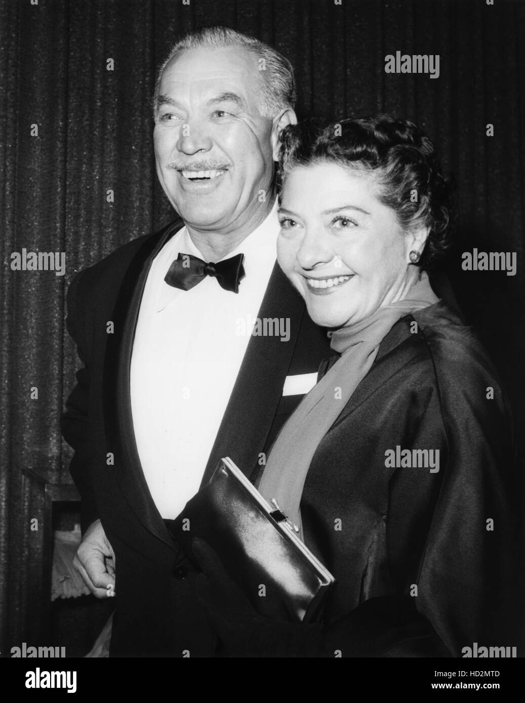 Ward Bond (left) and wife Mary Louise May at the Screen Directors Guild Awards dinner, late