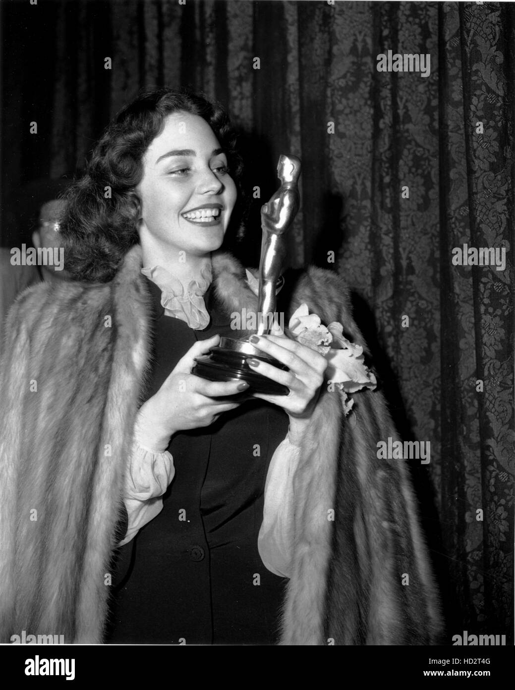 Jennifer Jones, with her Best Actress Oscar for THE SONG OF BERNADETTE