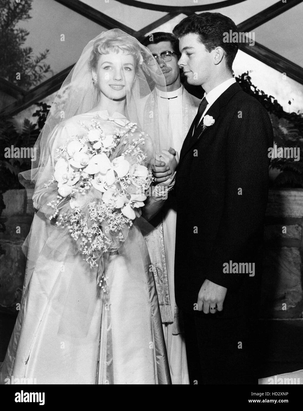 Wedding of Russ Tamblyn, right, and his first wife, actress Venetia Stevenson, February 14, 1956 Stock Photo