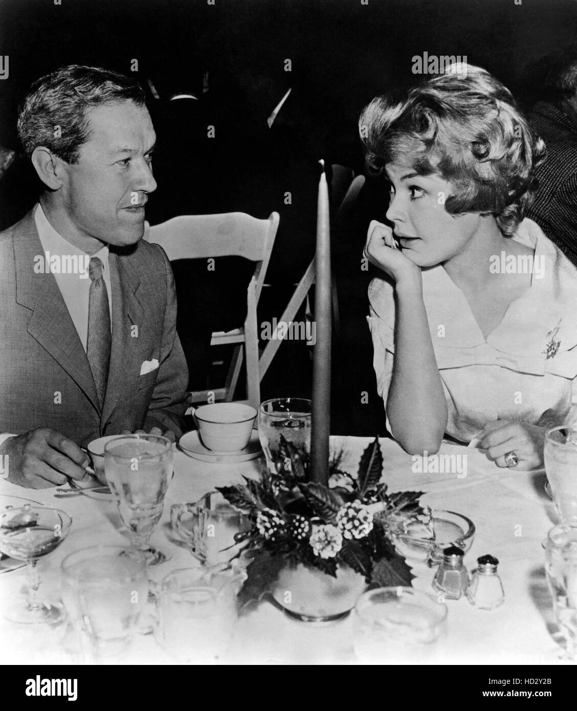 Sandra Dee chats with costume designer Jean Louis, in UniversalInternational commissary, 1960