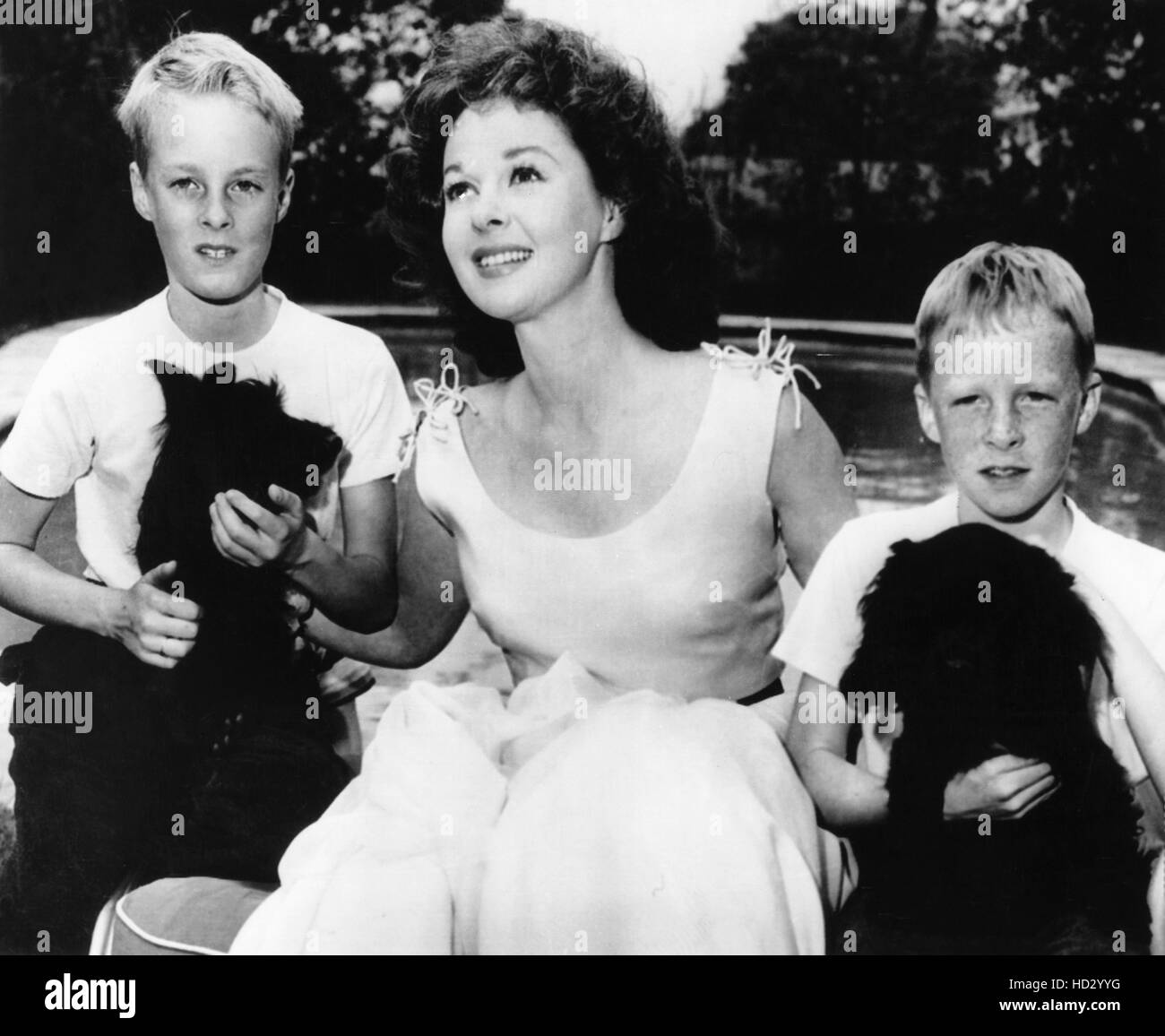 Susan Hayward, with her twin sons, Timothy Barker (right) and Gregory