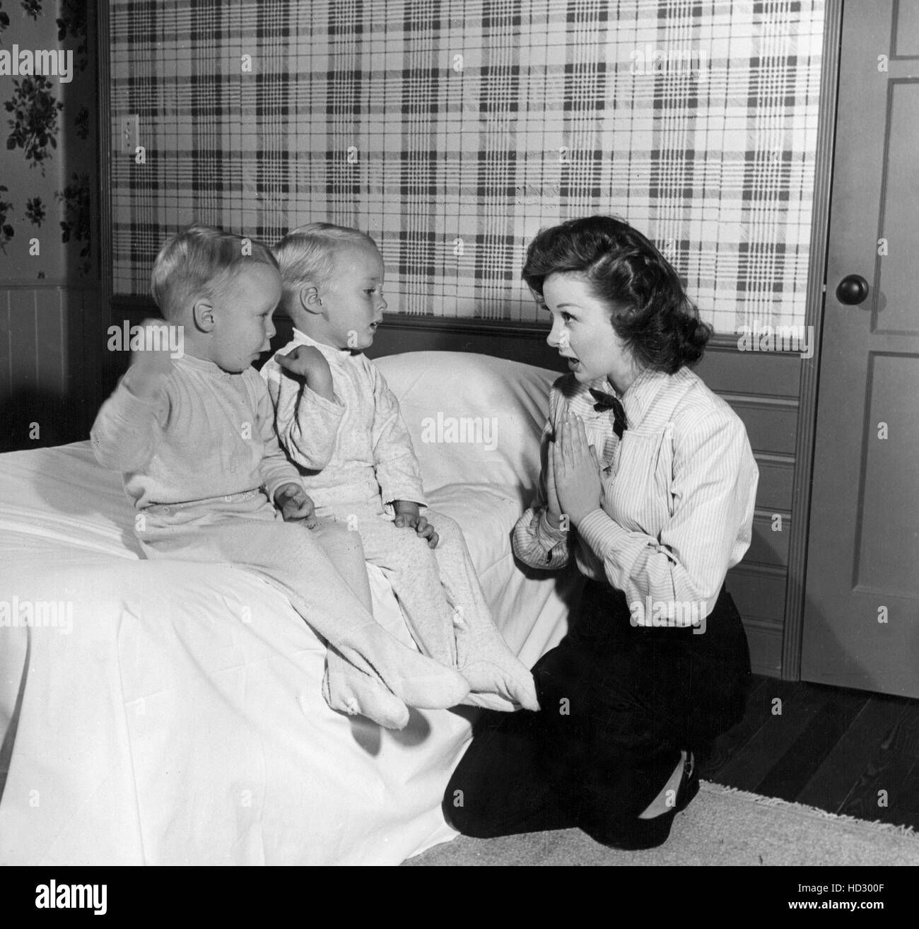 Three year old twins GREGORY BARKER and TIMOTHY BARKER get a prayer ...