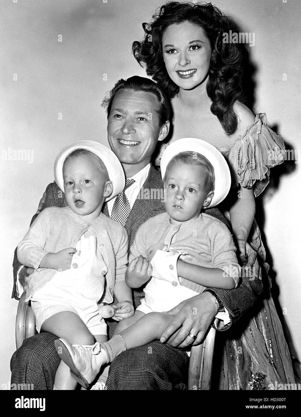 SUSAN HAYWARD, with two year old twin sons Gregory and Timothy Barker