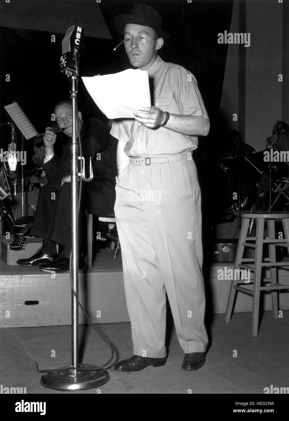 Bing Crosby during a radio broadcast, 1940s Stock Photo