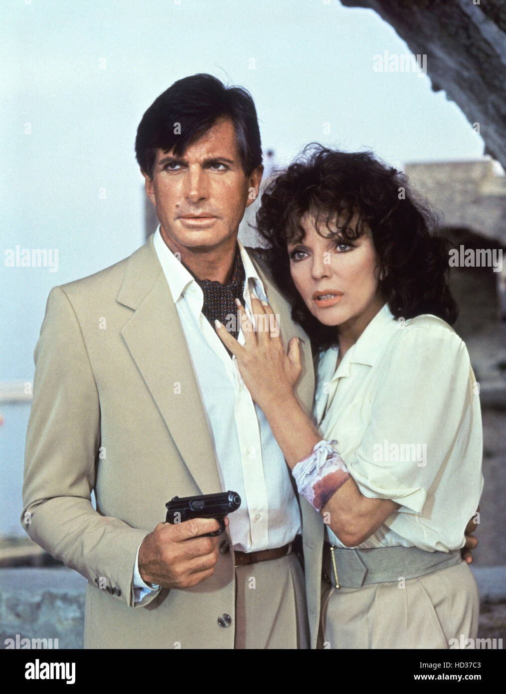 MONTE CARLO, (from left): George Hamilton, Joan Collins, 1986. © New