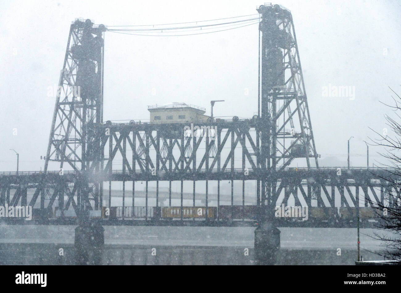 View of the Steel Bridge in downtown Portland, Oregon during a snowstorm Stock Photo