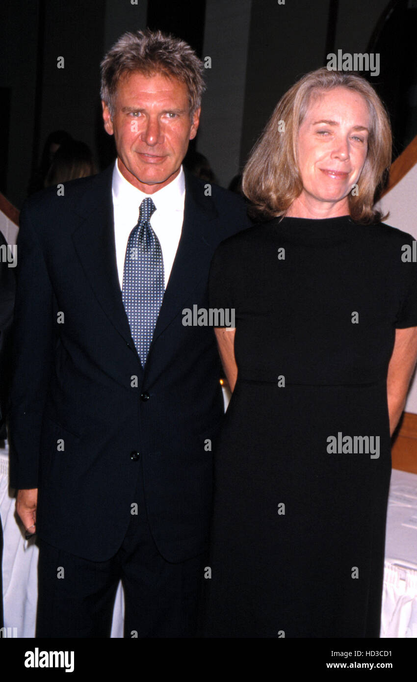 HARRISON FORD, and wife Melissa Mathison at the International Media