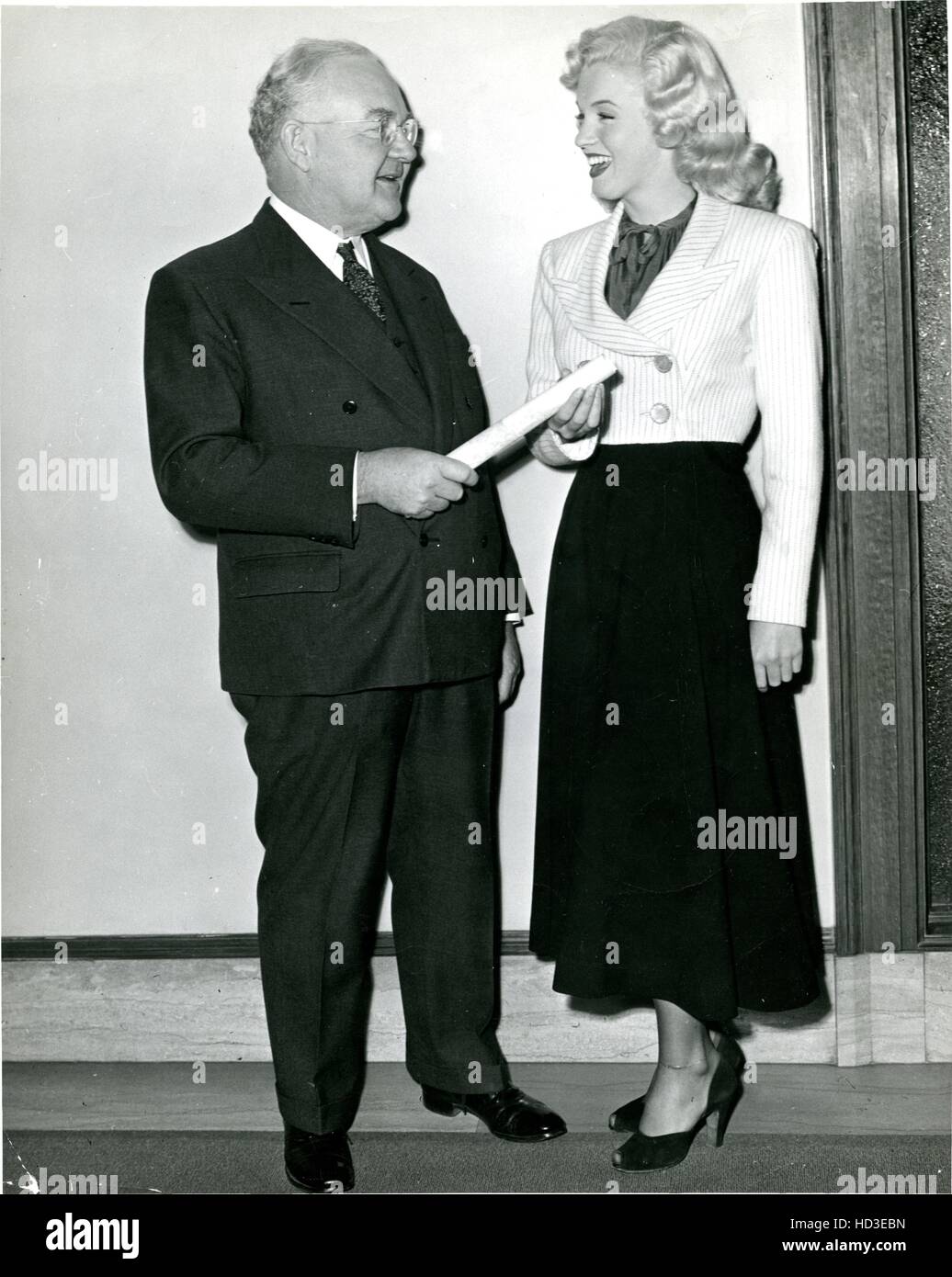Los Angeles Mayor Fletcher Bowron, with Columbia starlet Marilyn Monroe