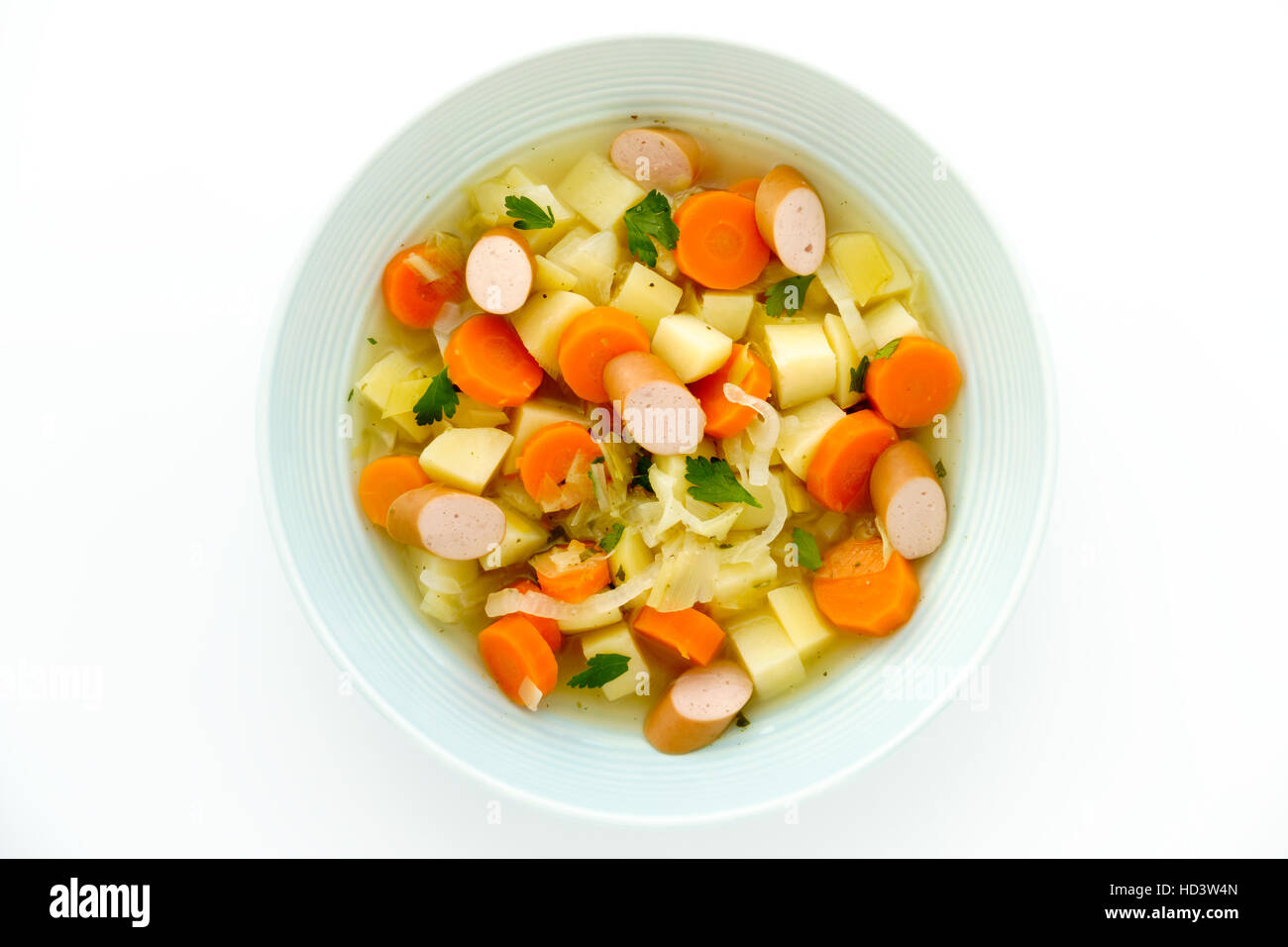 Frankfurter Sausage Stew in a Blue Soup Plate Stock Photo