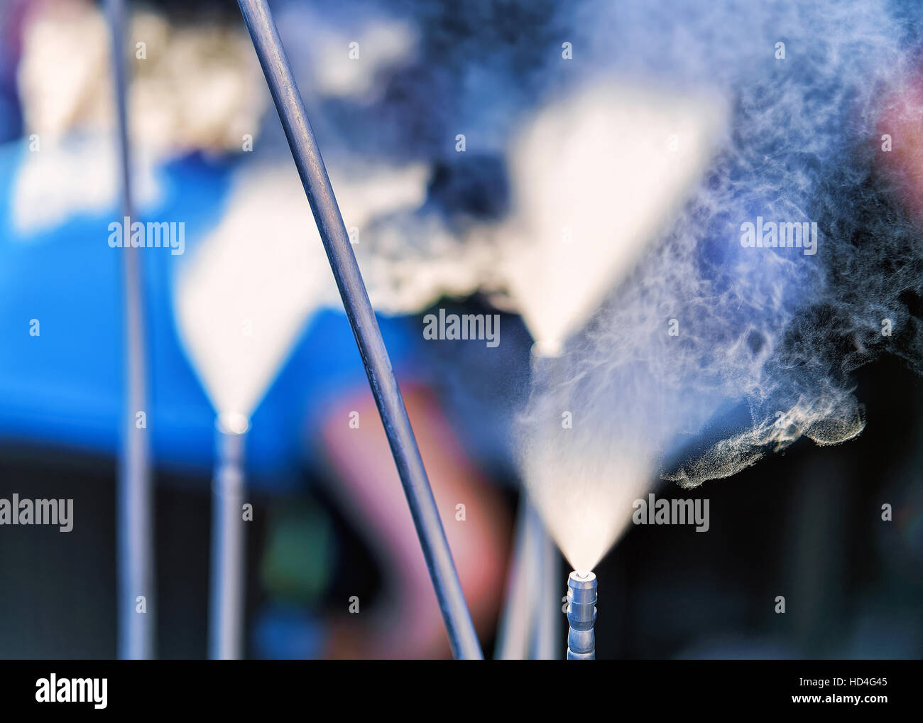 Water Sprayers with mist in the air on the blurred background Stock Photo