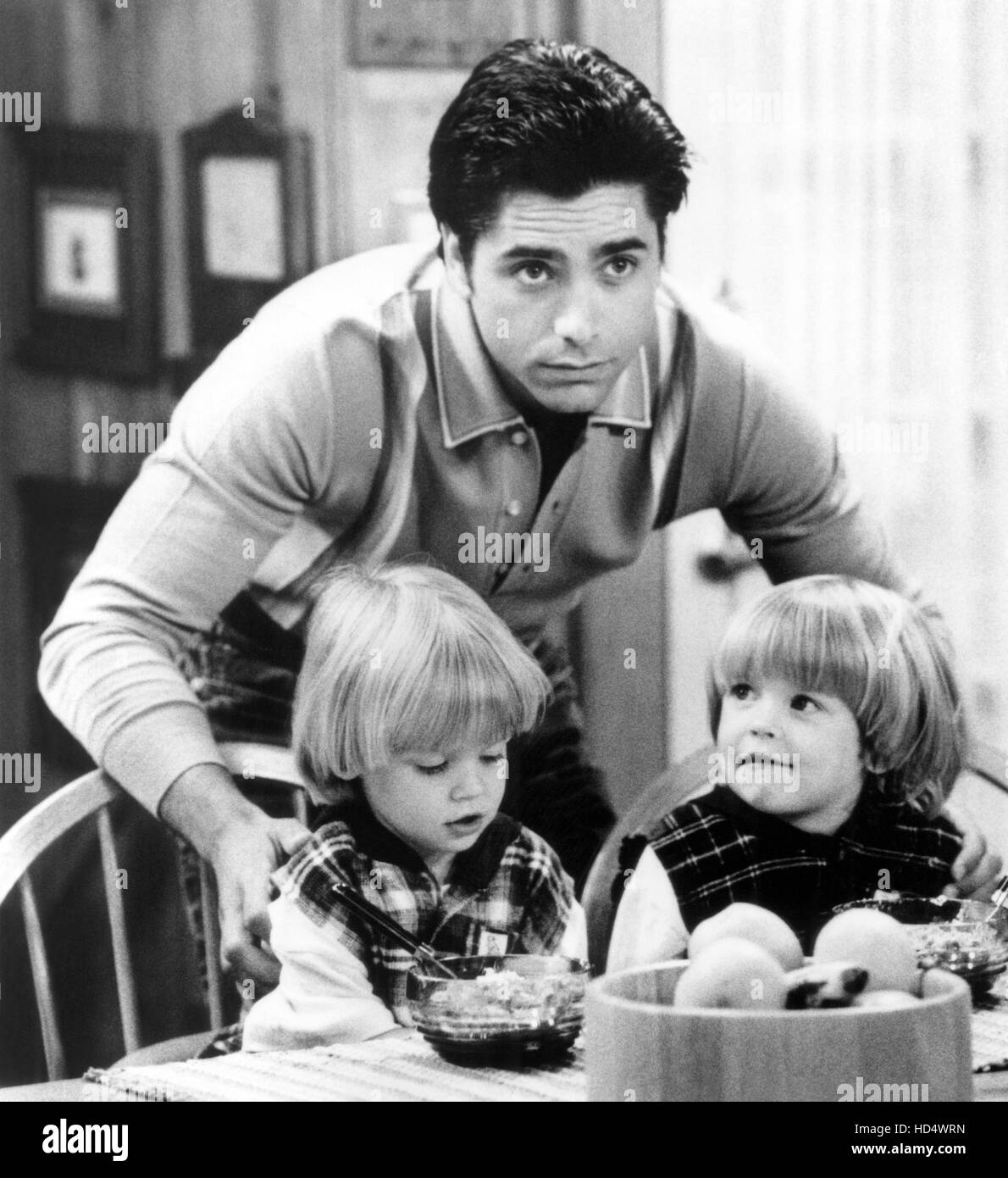 FULL HOUSE, John Stamos (back), Dylan/Blake TuomyWilhoit, (Season 8