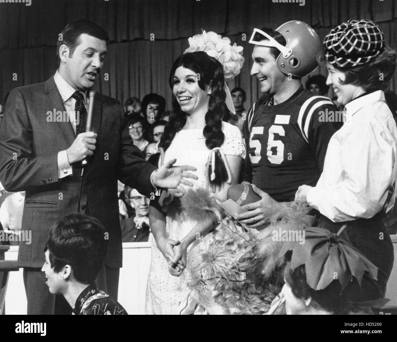 LET'S MAKE A DEAL, Monty Hall (far left) with contestants, (1969), 1963