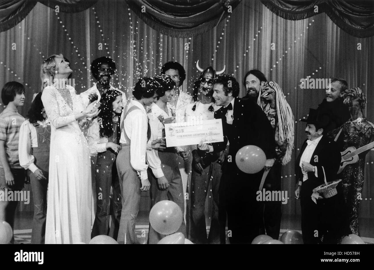 THE GONG SHOW, Chuck Barris (right front center) presenting prize money