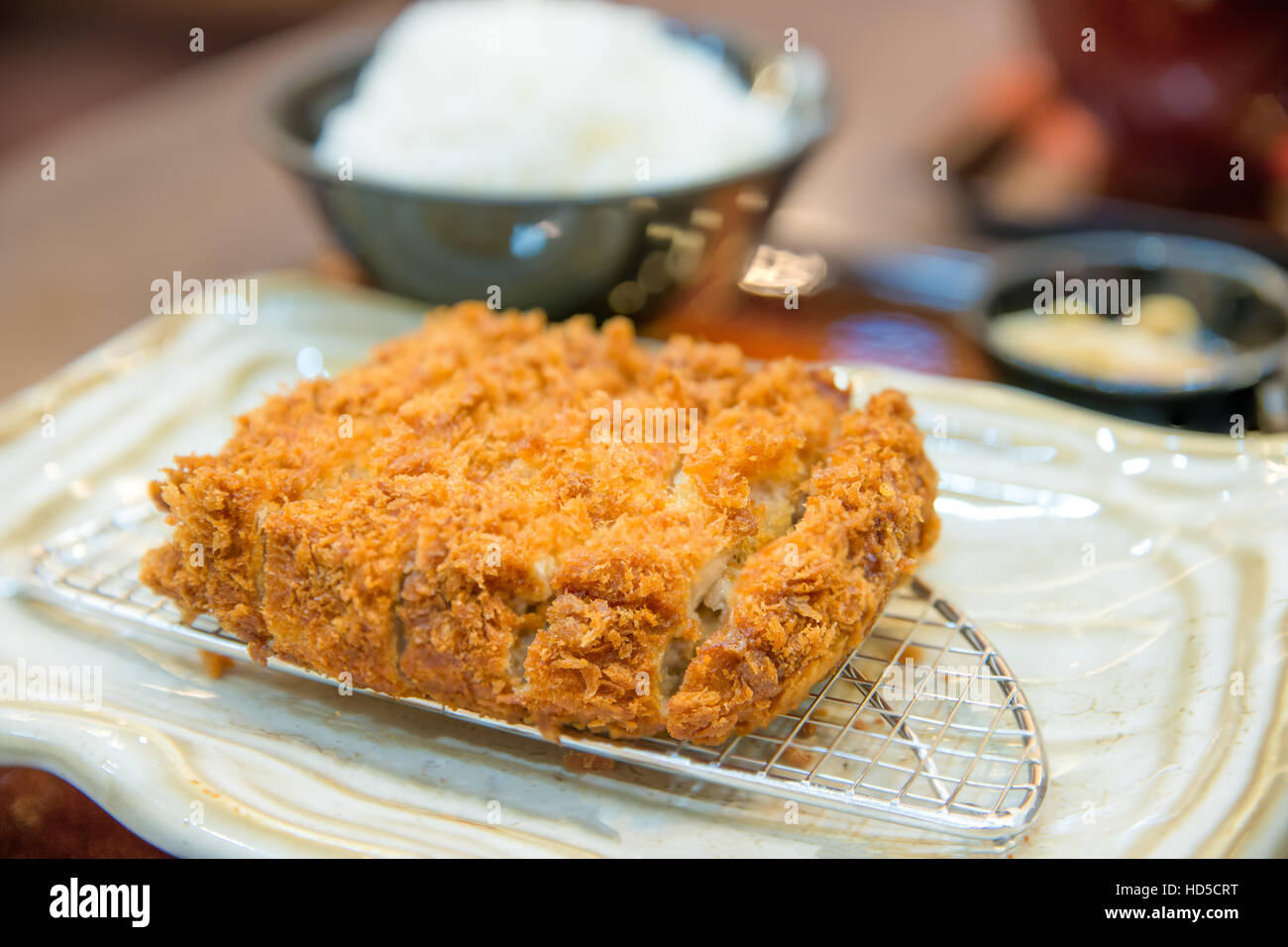 Fried Pork Cutlet serve with rice in dish at Japanese restaurant Stock Photo