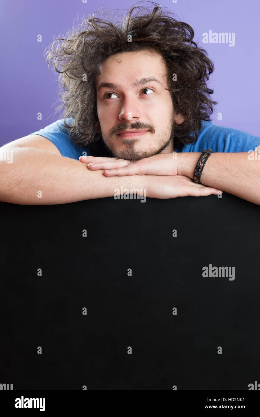 Man Cheerful Studio Portrait Concept, man with funny hair Stock Photo