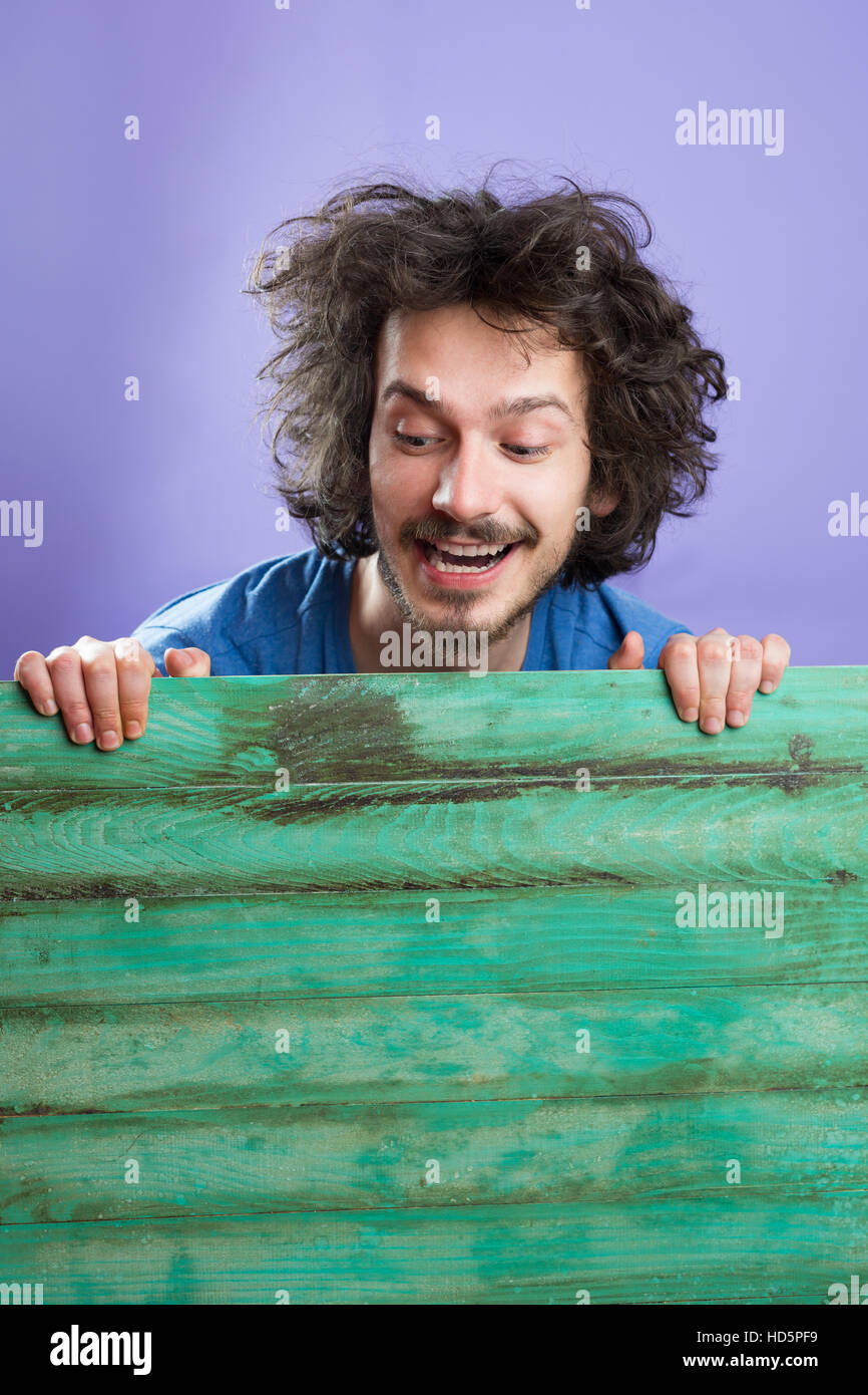 Man Cheerful Studio Portrait Concept, man with funny hair Stock Photo
