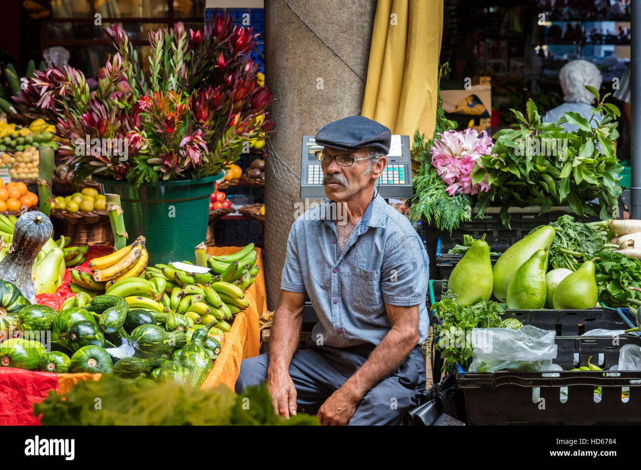 Grocer selling fruit, Market Hall, Funchal, Madeira, Portugal Stock Photo
