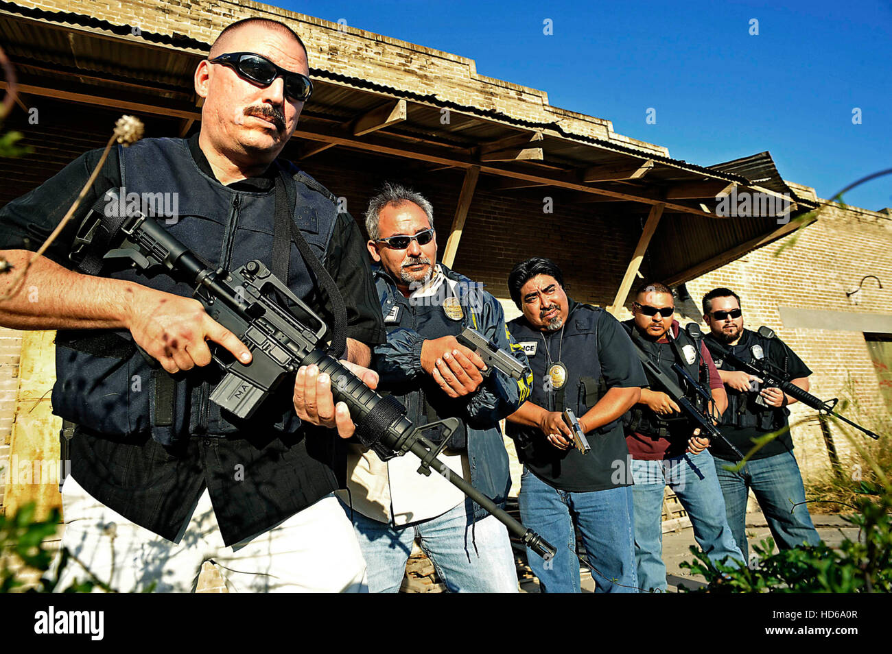 BORDERTOWN LAREDO, (from left) Sgt. Robert Sifuentes, Rodriguez