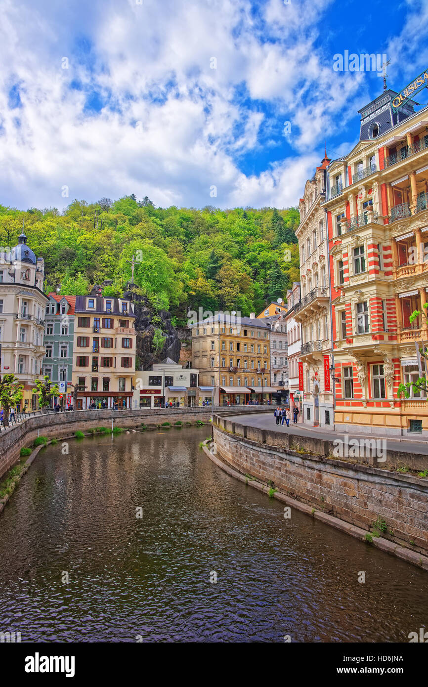 Karlovy vary, Czech republic - May 5, 2014: Luxury Grand Hotel Pupp and Embankment of River Tepla in Karlovy Vary, Czech republic. People on the backg Stock Photo