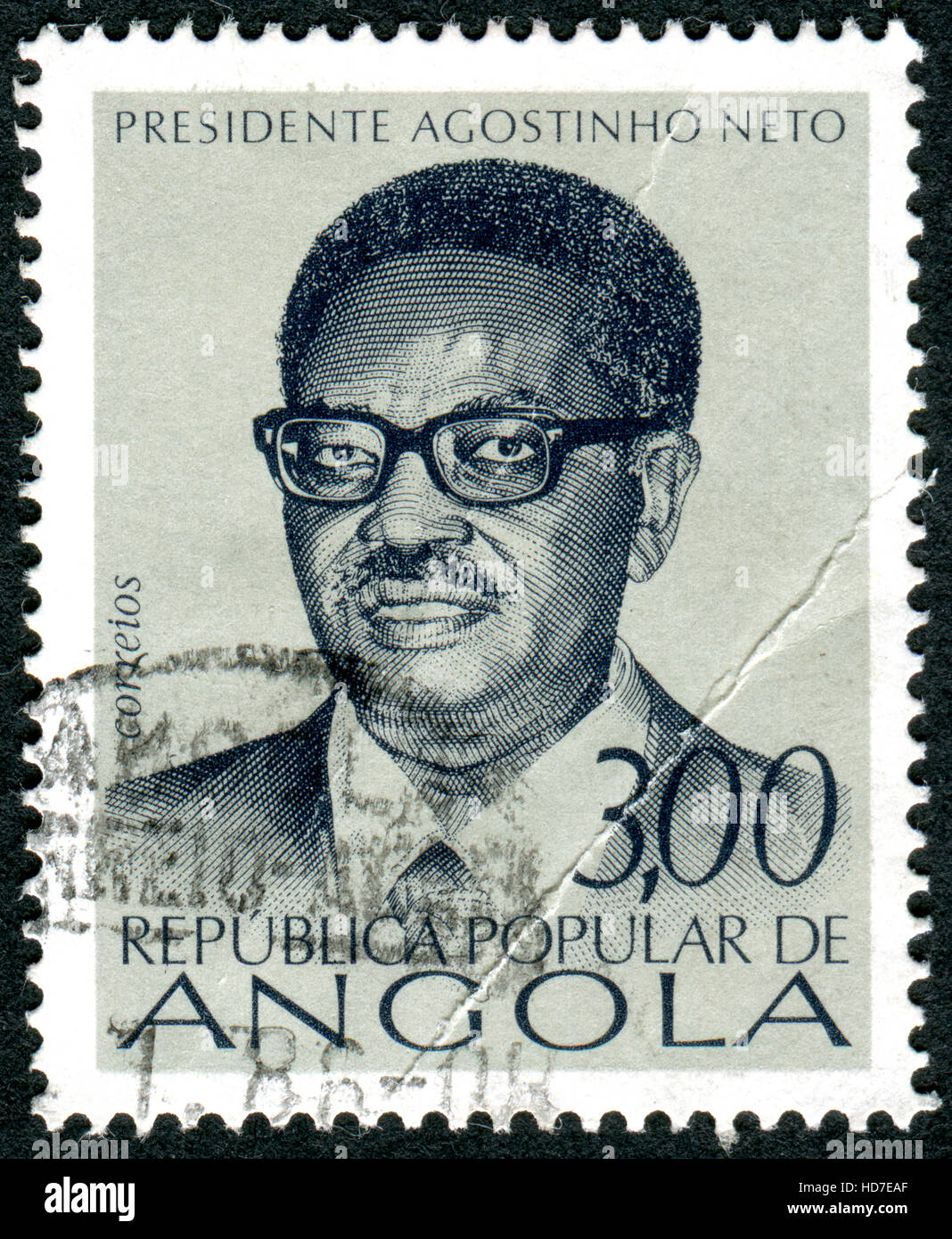 ANGOLA - CIRCA 1976: A stamp printed in Angola shows the President Agostinho Neto, circa 1976 Stock Photo