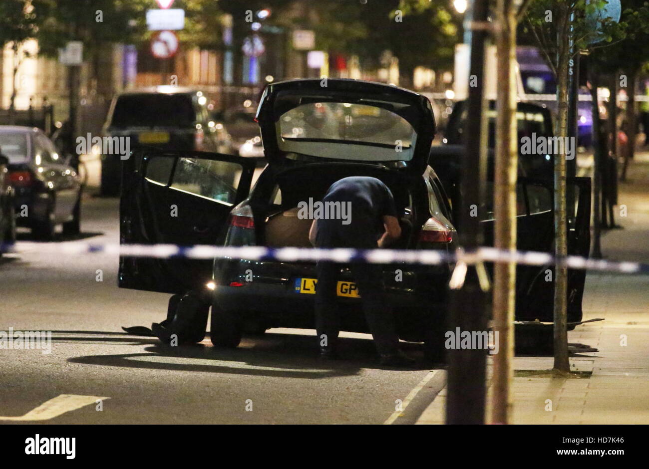 Police search a suspicious vehicle near BBC Broadcasting House in London  Featuring: Atmosphere Where: London, United Kingdom When: 14 Sep 2016 Stock Photo