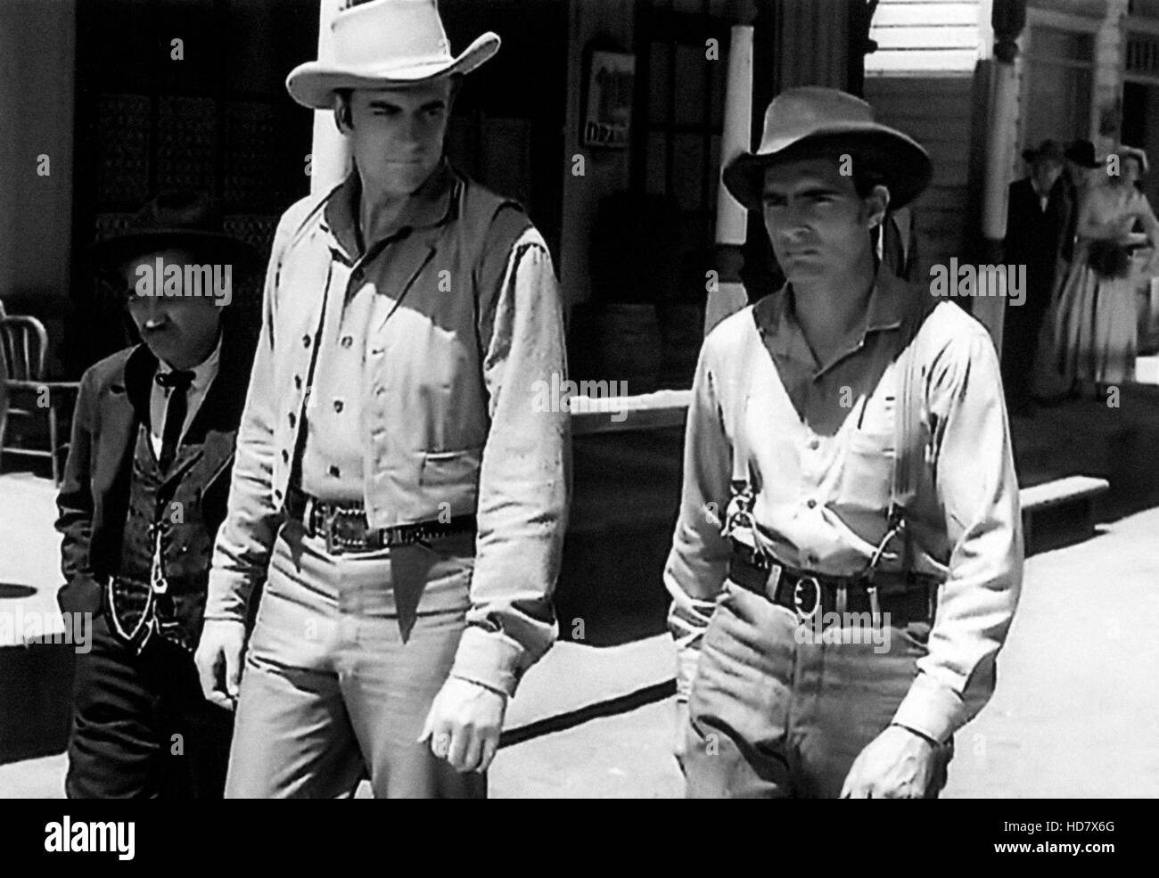GUNSMOKE, (from left) Milburn Stone, James Arness, Dennis Weaver