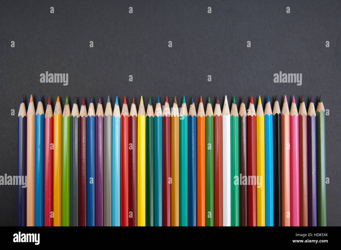 Color pencils isolated on black background Stock Photo