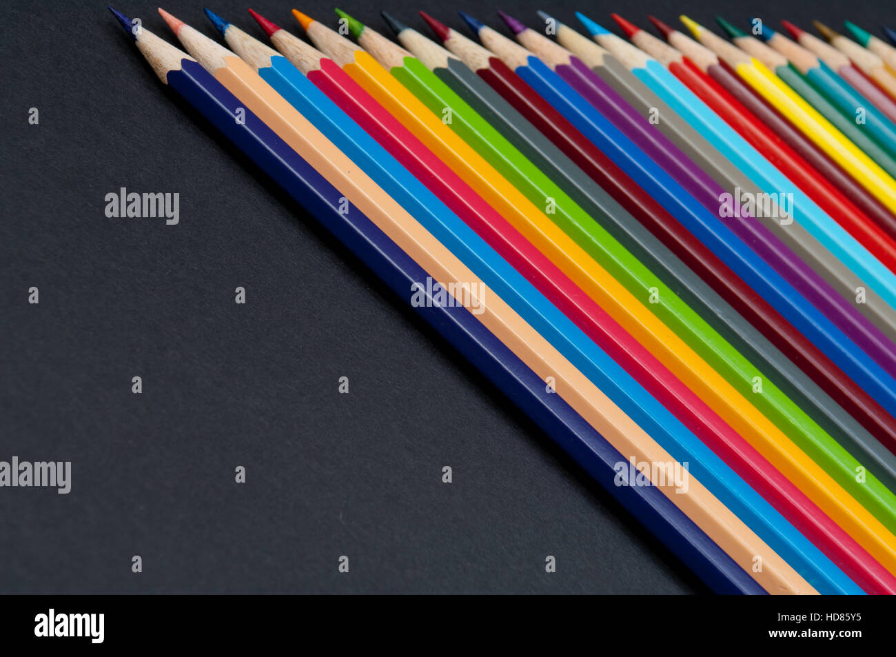 Color pencils isolated on black background Stock Photo