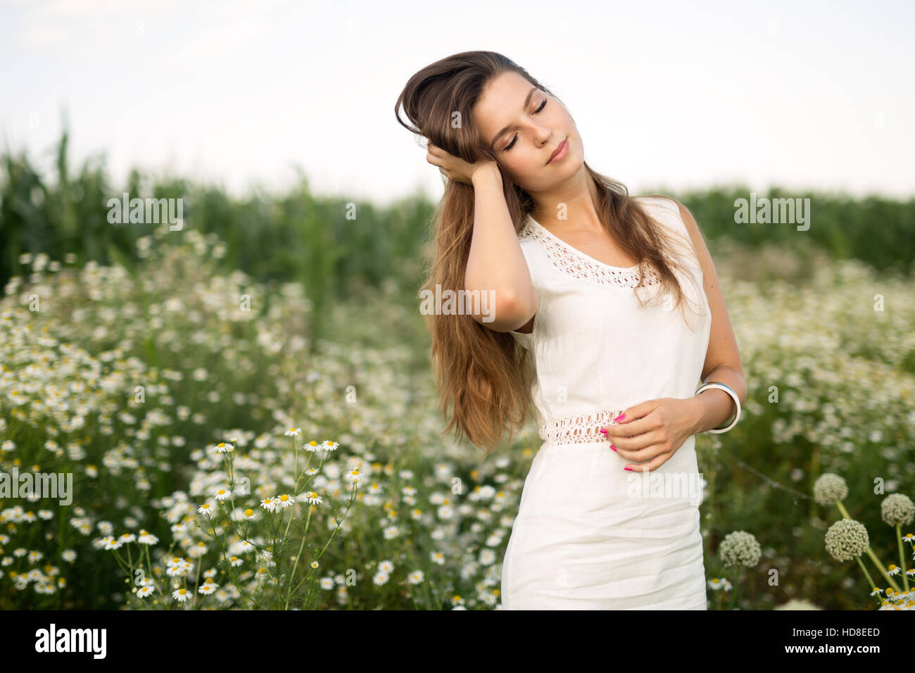 Woman suffering from headache due to allergy Stock Photo