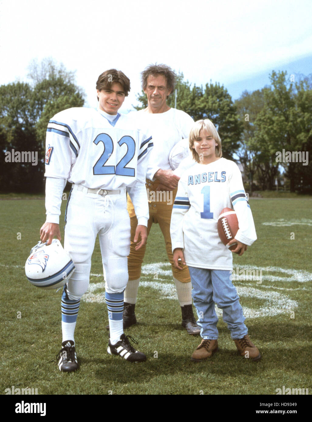 ANGELS IN THE ENDZONE, (from left): Matthew Lawrence, Christopher Lloyd, David Gallagher, 1997. © Walt Disney Television / Stock Photo
