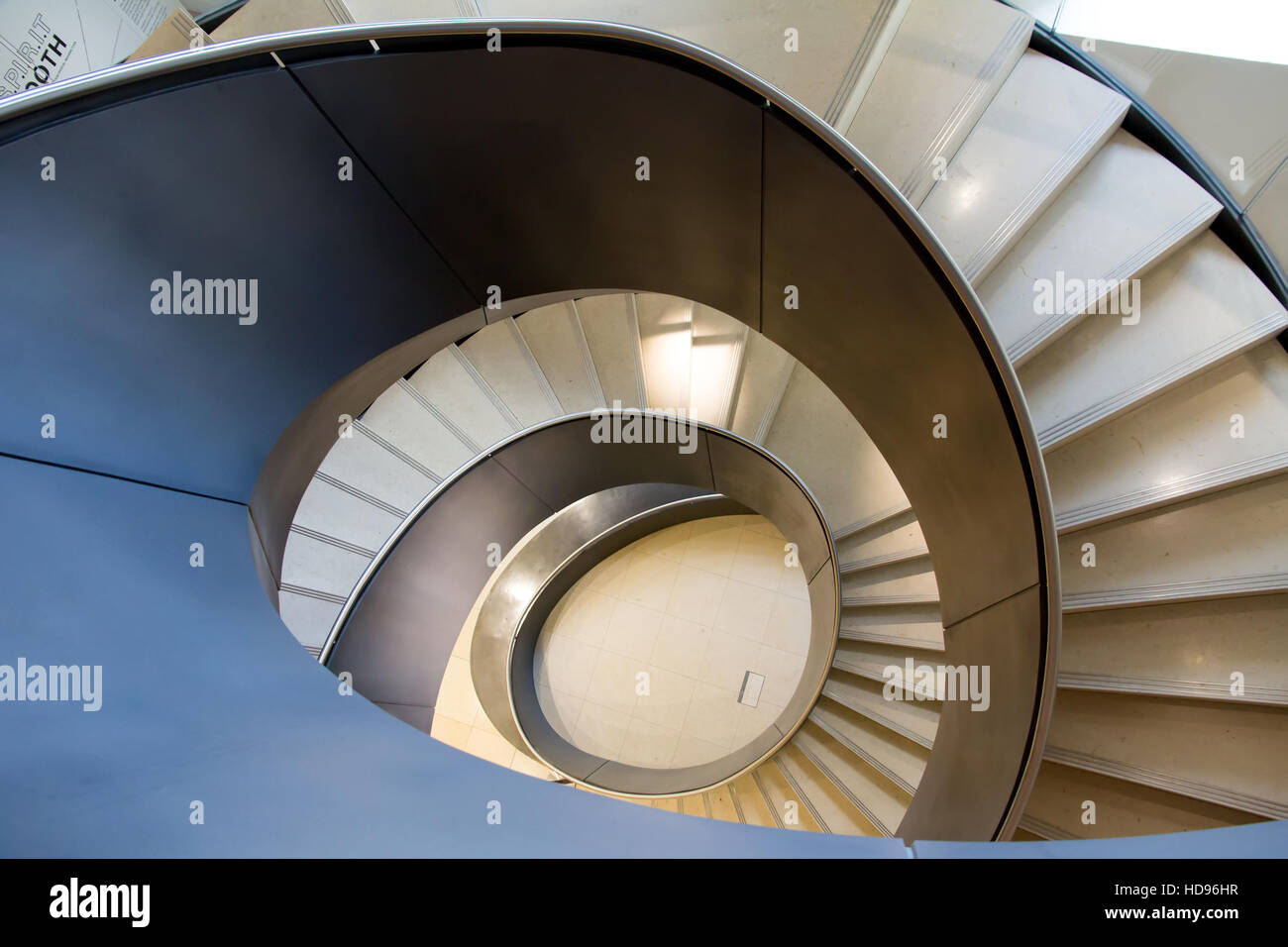 The modern spiral staircase at the Wellcome Trust Collection Museum, London England. Designed by Wilkinson Eyre Architects. Stock Photo