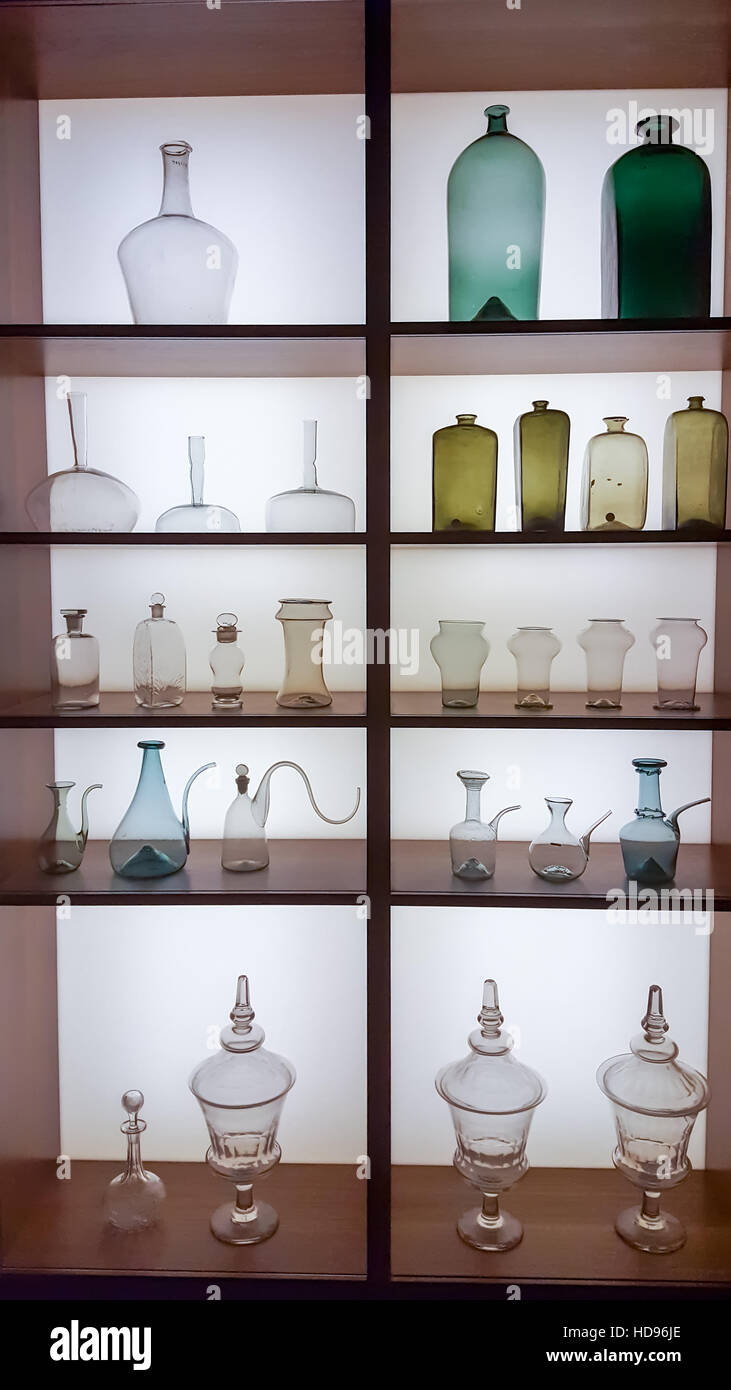 Glass medicine bottles on display as part of the Medicine Man Exhibition, Wellcome Trust Collection, Euston Road, London England Stock Photo