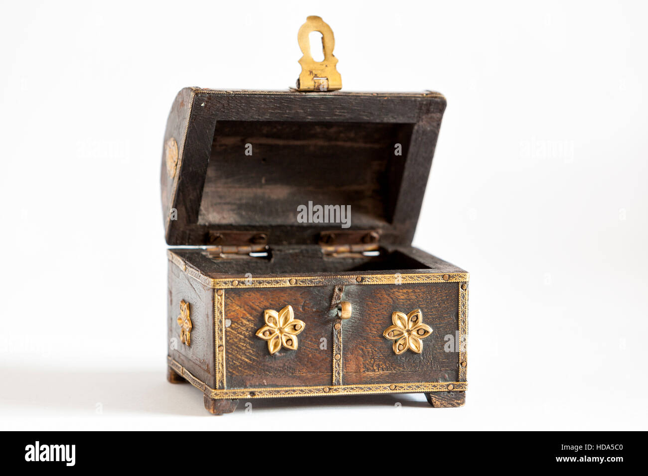 Old wooden open and empty chest on white Stock Photo