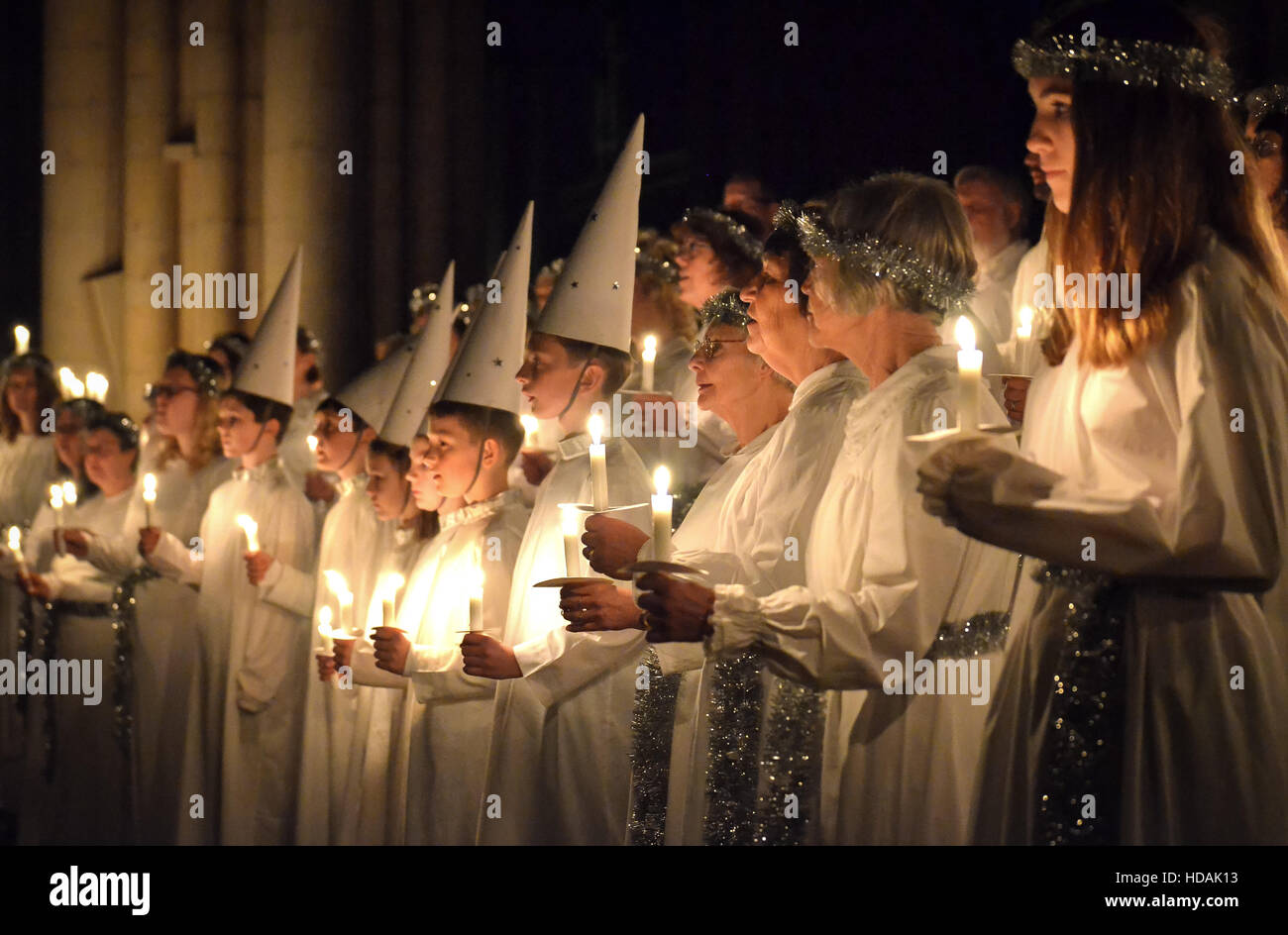 Candlelight procession of the Swedish choir at the Santa Lucia festival at York Minster, 9th December 2016 Stock Photo