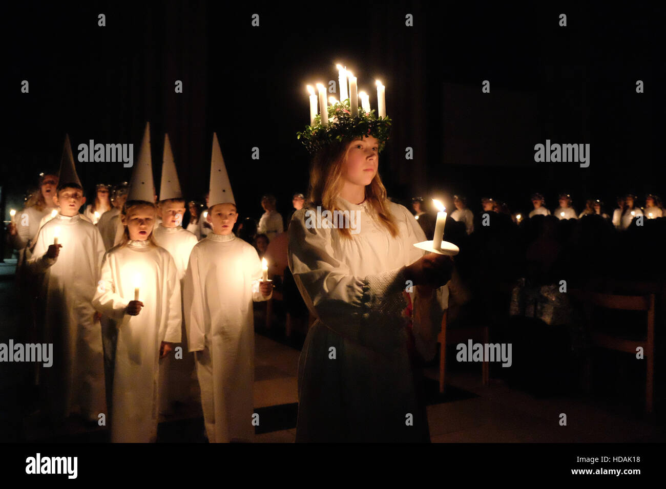 Candlelight procession of the Swedish choir at the Santa Lucia festival at York Minster, 9th December 2016 Stock Photo
