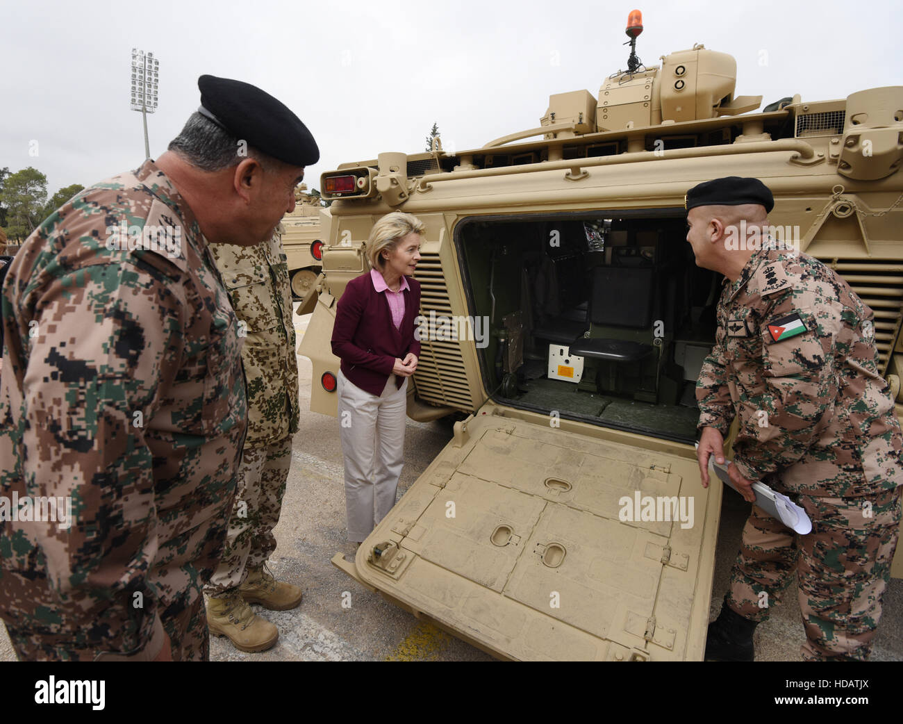 German Defence Minister Ursula von der Leyen (CDU) and the Jordanian General Leutnant Mahmud Freihat (l) looking at a tank of the Hassan Brigade on the grounds of the Raghadan Palace, Ammam, 11 December 2016. Sixteen Marder vehicles are being handed over to the country's military. The German Defence Minister's five-day visit to the region ends in the afternoon. Photo: Rainer Jensen/dpa Stock Photo