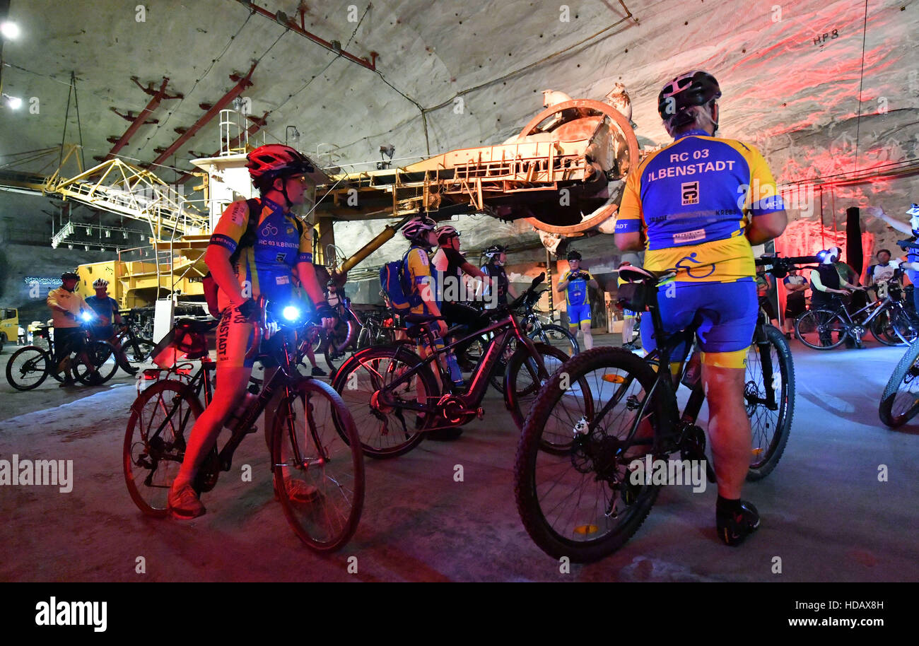 On a mountain bike tour in the Merkers Adventure Mines, bikers are looking  at the biggest underground bucket wheel excavator in the world inside a  salt mine up to 800 meters deep